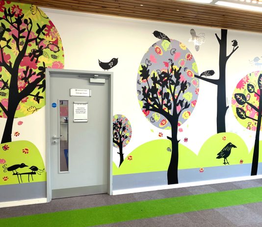 Presentation room door in children's department, public library in Hampshire, UK